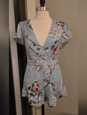 Bebe Light Blue Floral V-Neck Romper Size 2